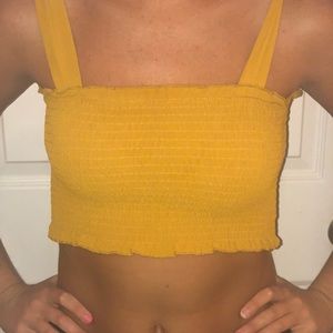 SOLD Smocked mustard crop top